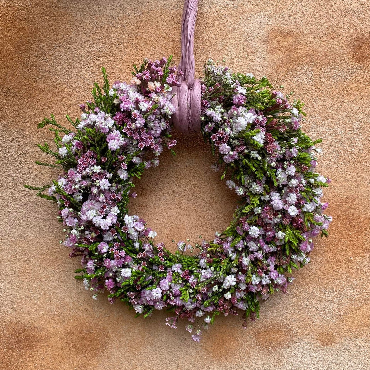 Krans i rosa nuancer