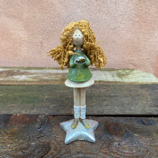 Julefigur. Pige med stjerne