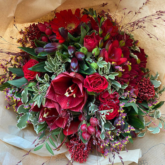 Julebuket i røde farver